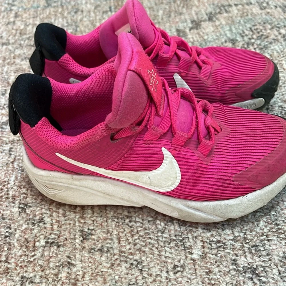 Girls pink Nike sneakers 11c